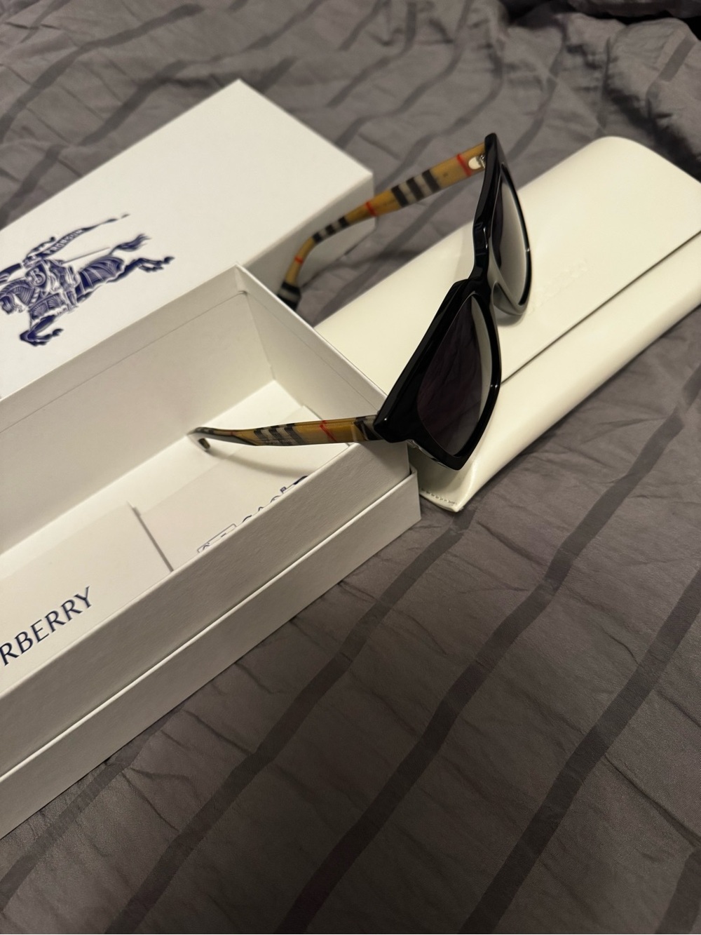 Burberry Unisex Black Sunglasses with Beige Check Temples